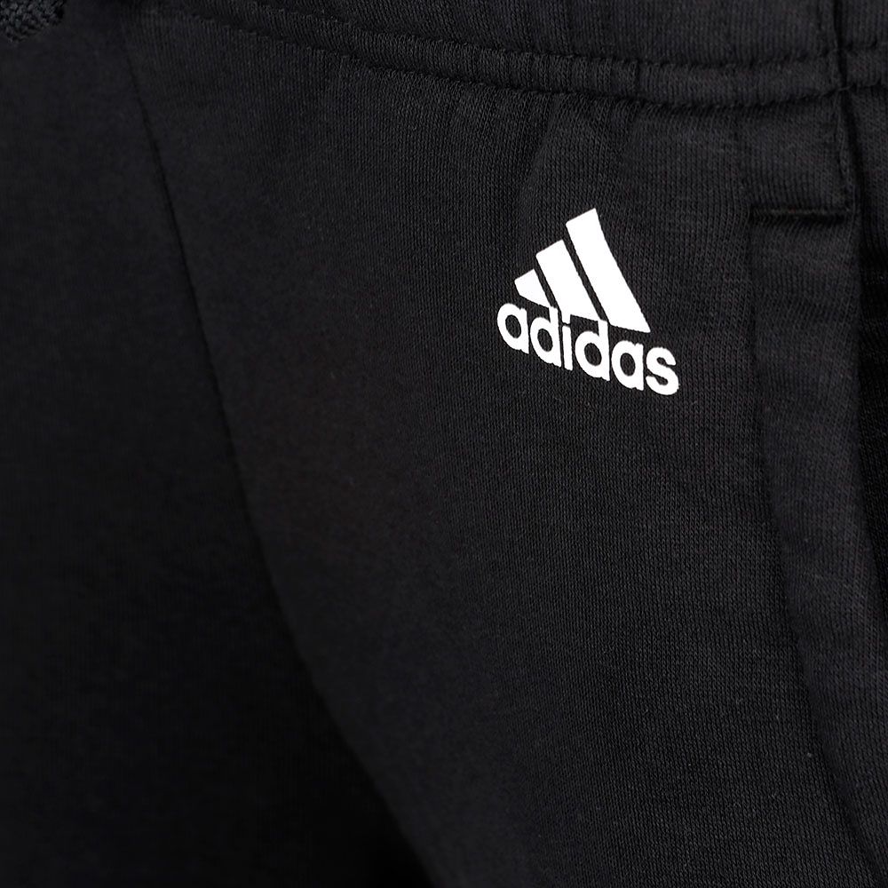 Pantalón de Paseo Essentials Tres Bandas 3/4 Mujer Negro - Fútbol Factory