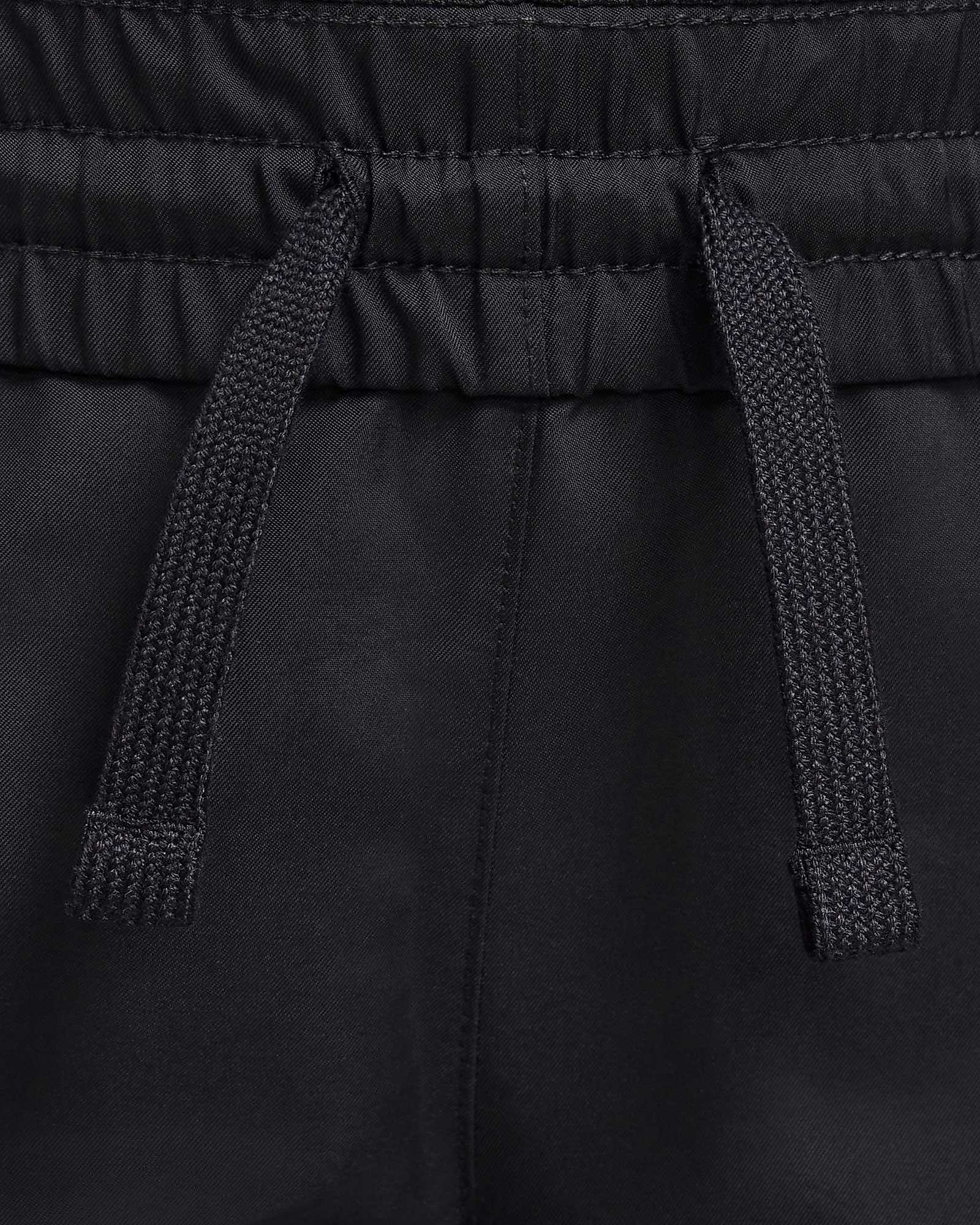 Pantalón Nike Sportswear Club Woven - Fútbol Factory