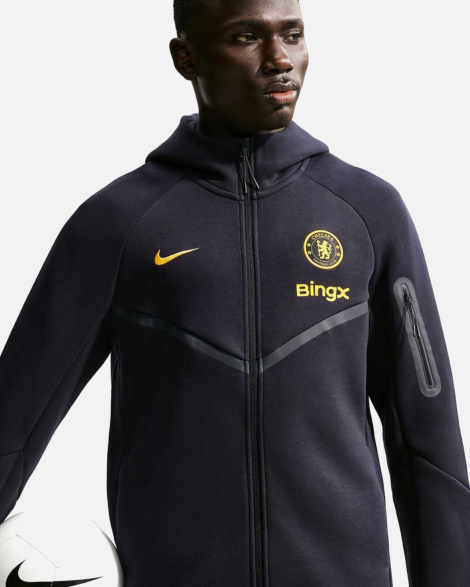 Sudadera Chelsea FC 2026/2027 Tech Fleece Windrunner Sudadera Chelsea FC 2026/2027 Tech Fleece Windrunner - Fútbol Factory