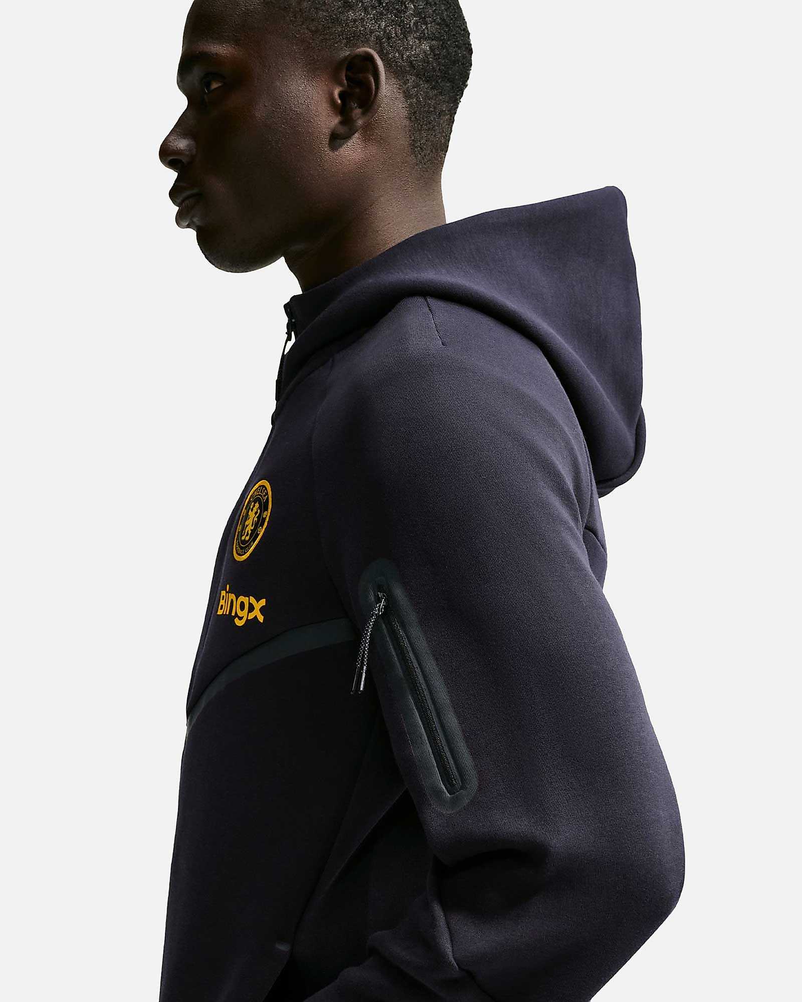 Sudadera Chelsea FC 2026/2027 Tech Fleece Windrunner Sudadera Chelsea FC 2026/2027 Tech Fleece Windrunner - Fútbol Factory